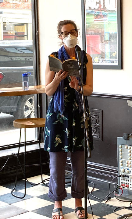 Elena Johnson reading at PEP Rally.